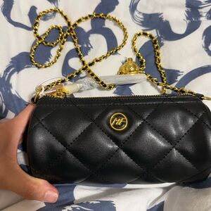 Black Cylinder Quilted Chain Crossbody Bag by Mark Fairwhale